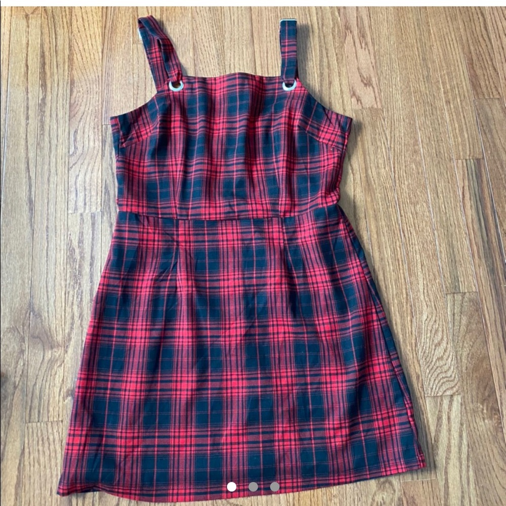 red and black plaid jumper